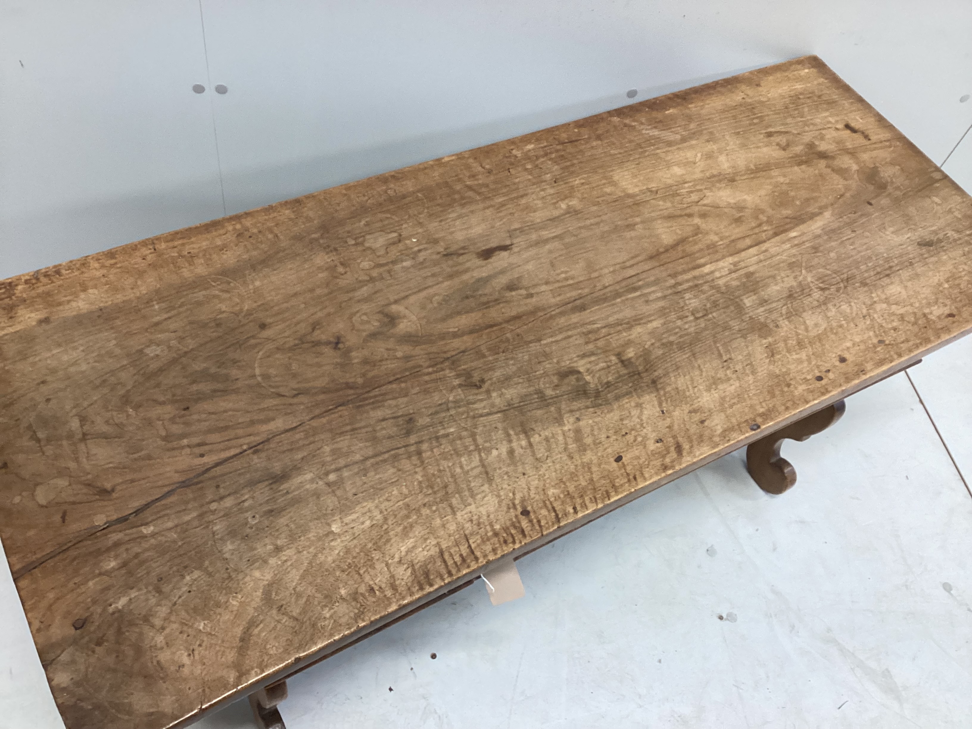 A Spanish style rectangular walnut coffee table, width 117cm, depth 47cm, height 51cm